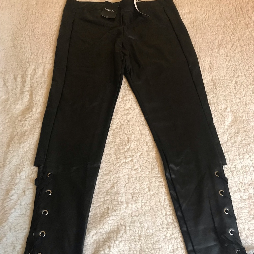 A pair of faux leather pants